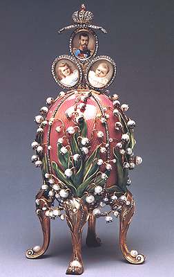 Imperial Coronation Easter Egg. Presented by Czar Nicolas II to his wife, Czarina Alexandra Feodorovna, Easter 1898. The trio of portraits show the Czar and his daughters ,Grand Duchesses Olga and Tatiana