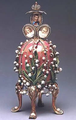 Imperial Coronation Easter Egg. Presented by Czar Nicolas II to his wife, Czarina Alexandra Feodorovna, Easter 1898. The trio of portraits show the Cz